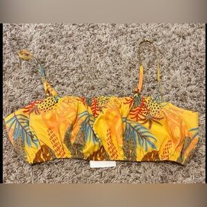 It's a crop top with a multicolored tropical print from Forever 21.